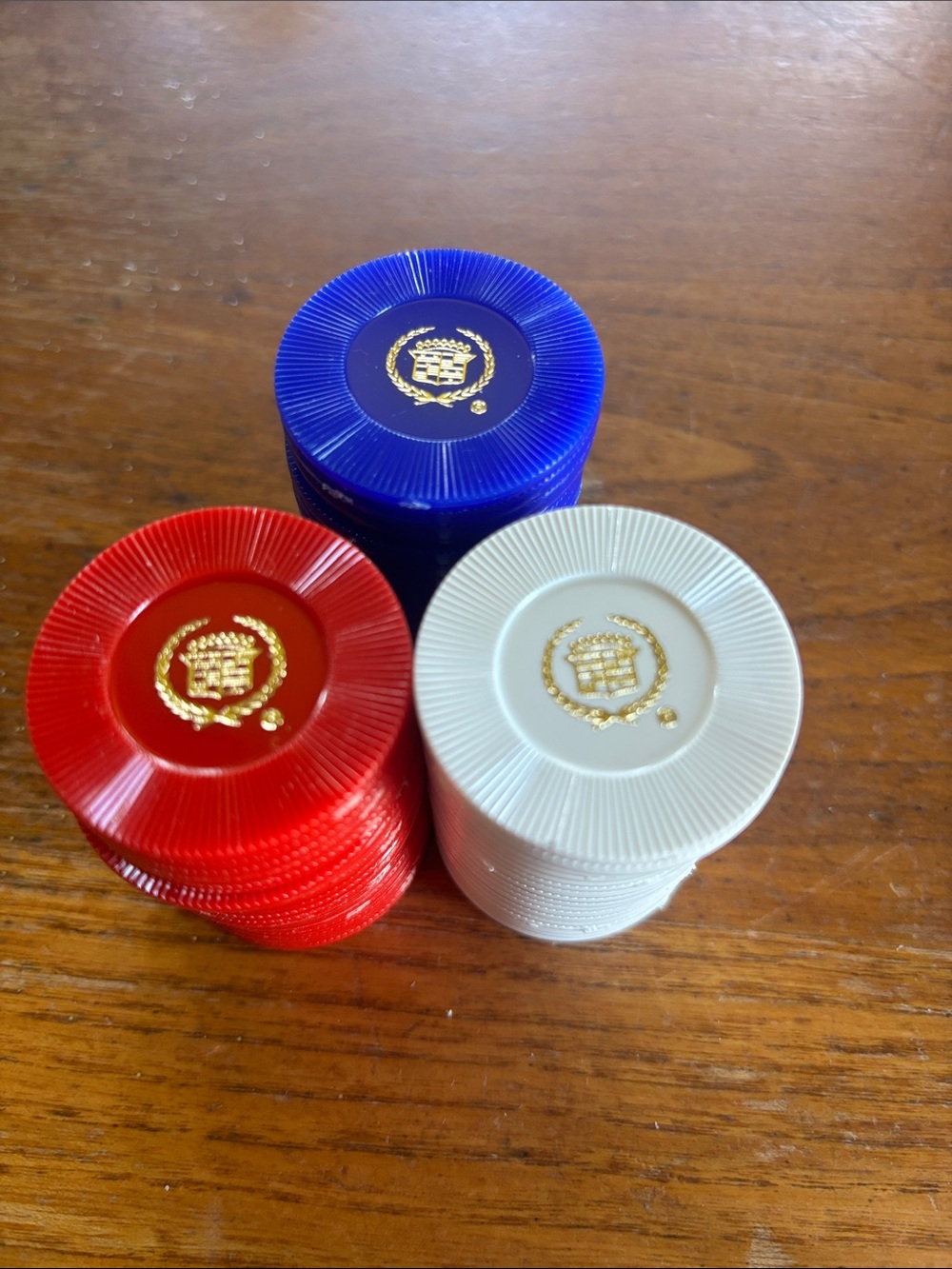 Vintage lot of 57 Cadillac®️ gold color emblem red, white & blue poker chips